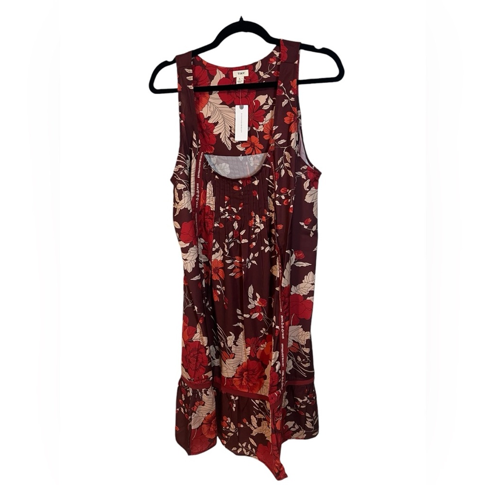 An Anthropologie floral dress in size large